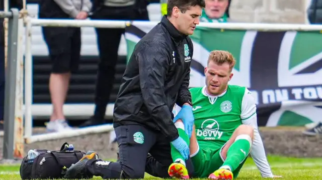 Chris Cadden receiving treatment