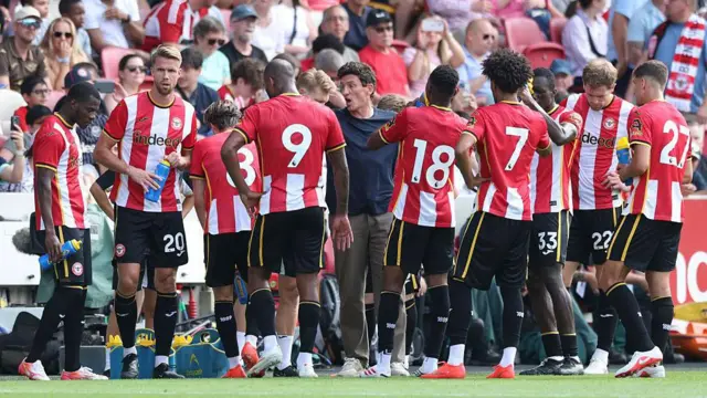 Keith Andrews talks to his players during the pre-season friendly