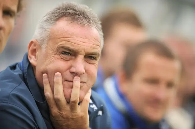 Dave Jones looks out with hand on his chin during his time as Cardiff manager