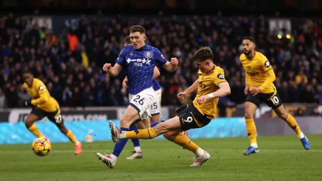 Joergen Strand Larsen of Wolverhampton Wanderers misses a chance whilst under pressure from Dara O'Shea of Ipswich Town during the Premier League match between Wolverhampton Wanderers FC and Ipswich Town FC at Molineux