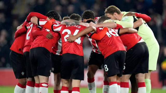 Southampton players stand in a huddle