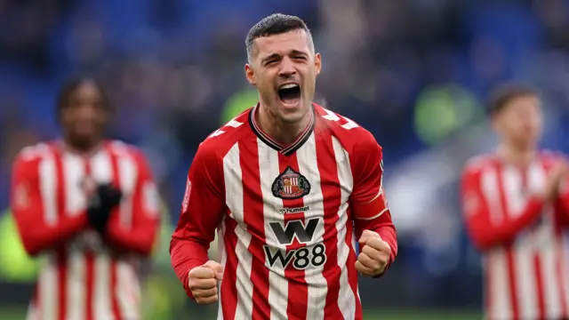 Granit Xhaka of Sunderland celebrates victory after his side wins the penalty shoot-out during the Emirates FA Cup Third Round match between Everton and Sunderland at Hill Dickinson Stadium on January 10, 2026