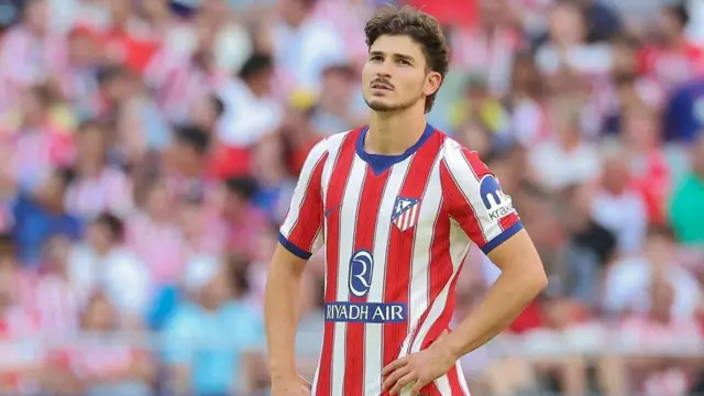 Julian Alvarez puts his hands on his hips in frustration