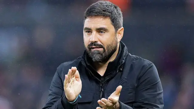 Swansea head coach Vitor Matos applauds