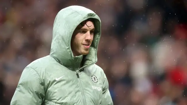  Cole Palmer of Chelsea is seen with his coat on