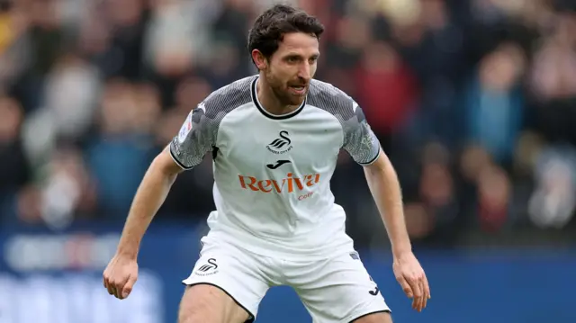 Joe Allen in action for Swansea earlier this season