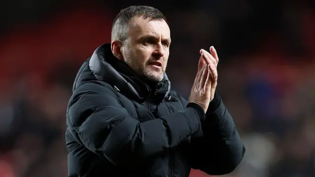 Nathan Jones applauds the Charlton fans after a game