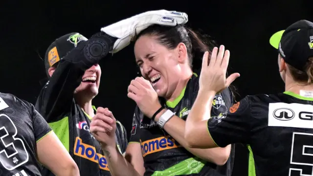 Em Arlott celebrates wicket