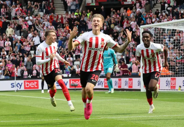 Jack Clarke celebrating his goal against Southampton at the Stadium of Light with Neil and Ba behind him.