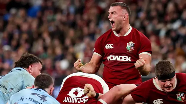Ben Earl of British & Irish Lions celebrates his side winning a penalty from a scrum