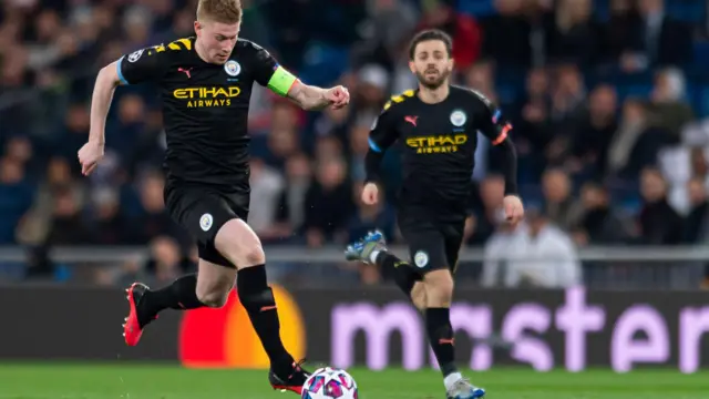 Kevin de Bruyne drives forward with the ball