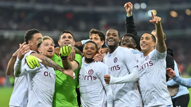 Players of Aston Villa celebrate after the team's victory in the penalty shoot out in the UEFA Europa Conference League quarter-final second leg match between Lille and Aston Villa at Stade Pierre Mauroy