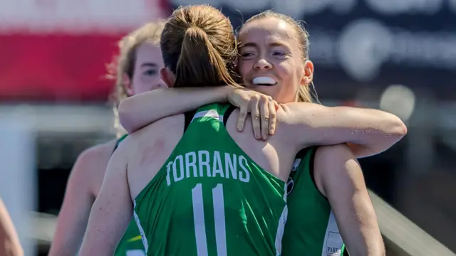 Ireland players celebrate their win over Canada 