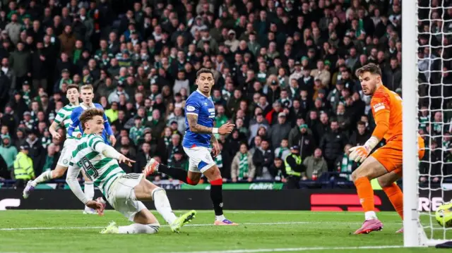 Callum Osmand scores for Celtic against Rangers
