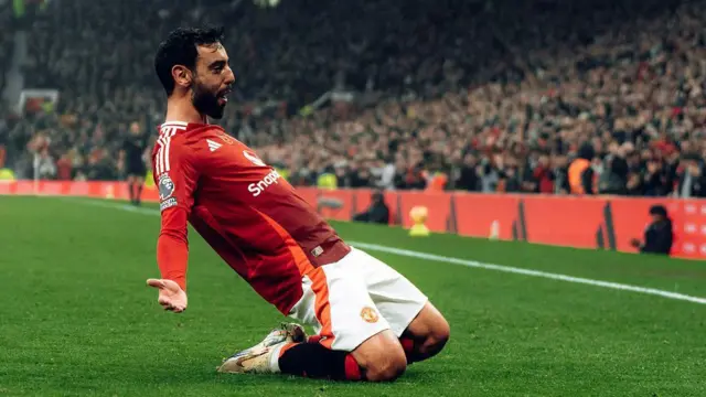 Bruno Fernandes of Manchester United celebrates scoring their first goal during the Premier League match against Leicester