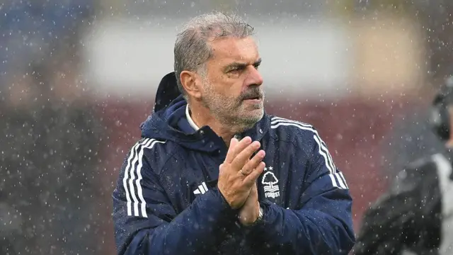 Ange Postecoglou applauds his team's supporters 