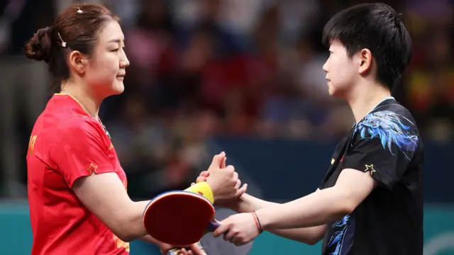 Chen Meng and Sun Yingsha shakes hands after their gold medal match