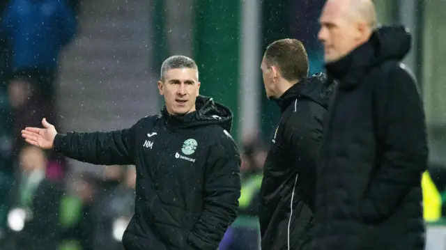 Nick Montgomery speaks to the fourth official during the Scottish Cup game against Rangers