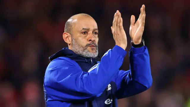 Dejected Nuno Espirito Santo applauds fans after defeat