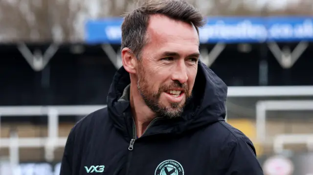 Christian Fuchs on the touchline 