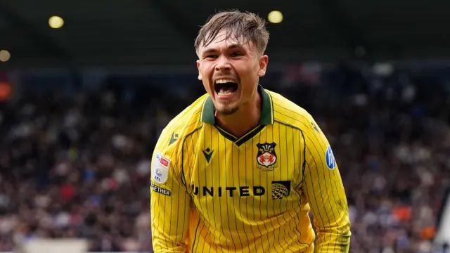 Wrexham's Callum Doyle celebrates