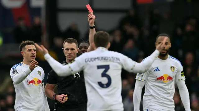 Referee Thomas Bramall shows Gabriel Gudmundsson a red card