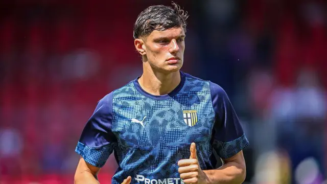 Giovanni Leoni warms up ahead of the the pre-season friendly match between FC Heidenheim and Parma Calcio at FC Heidenheim Voith-Arena 