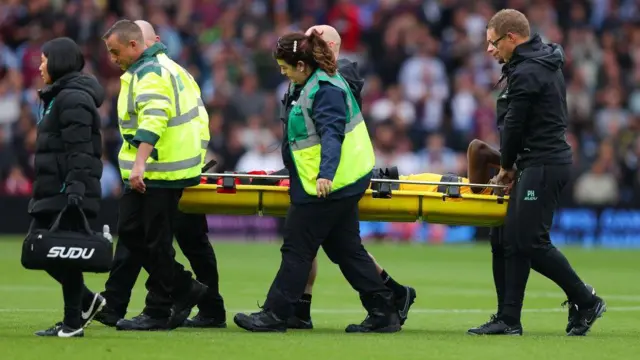 Yerson Mosquera is stretchered off during the defeat to Aston Villa