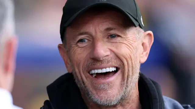 A close up of Oxford United boss Gary Rowett smiling