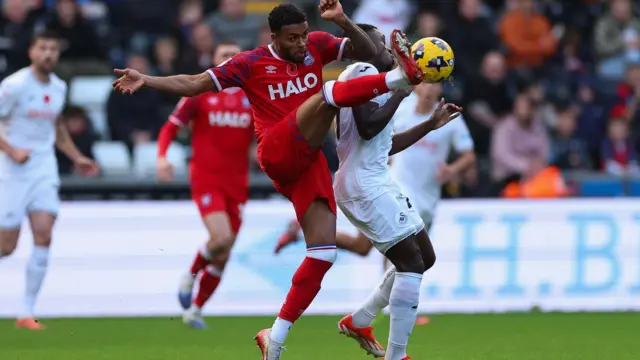 Zeidane Inoussa and Darnell Furlong during Swansea's defeat to Ipswich 