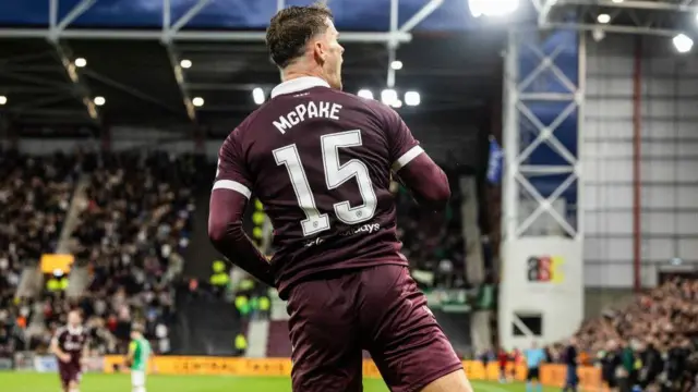 Hearts' Josh McPake celebrates after crossing the ball that leads to an own goal from Rapid Vienna's Serge-Philippe Raux-Yao to make it 1-1 during a UEFA Conference League Playoff Round First Leg match between Heart of Midlothian and Rapid Vienna, at Tynecastle Park, on August 20, 2026, in Edinburgh, Scotland.
