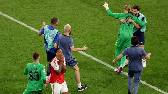 Gabriel of Arsenal looks dejected after missing the team's fifth penalty
