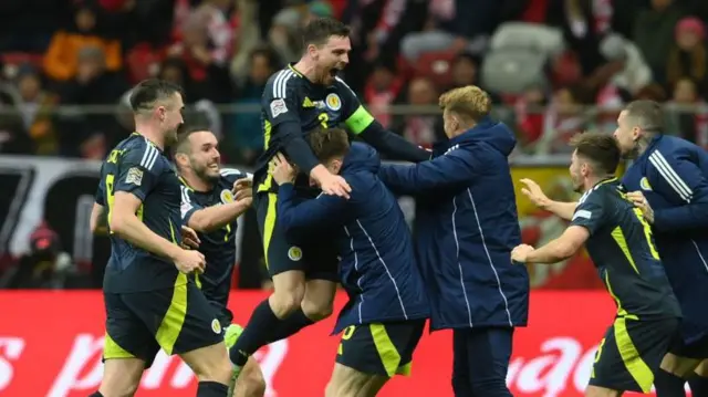 Andy Robertson celebrates after scoring for Scotland