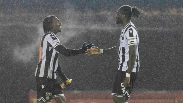 Toyosi Olusanya (left) celebrates with fellow goal-scorer Richard Taylor