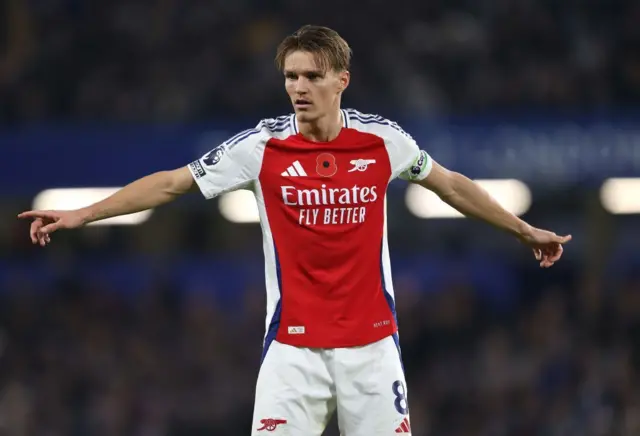 Martin Odegaard playing for Arsenal