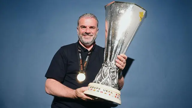 Ange Postecoglou with Europa League trophy