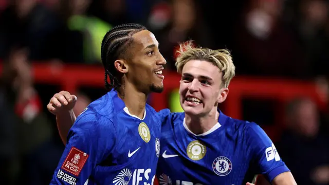 Joao Pedro of Chelsea celebrates scoring his team's fourth goal with teammate Jesse Derry
