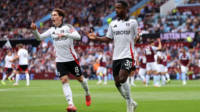 Fulham players appeal an offside decision