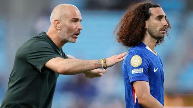 Enzo Maresca and Marc Cucurella during Chelsea's game against Benfica