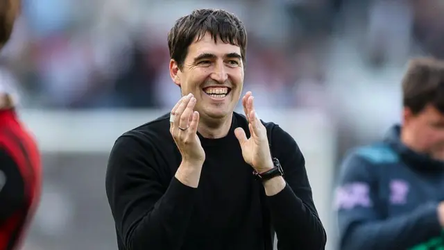 Andoni Iraola claps towards the crowd