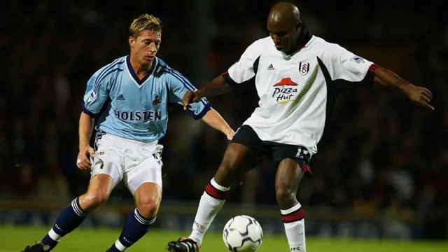 Tottenham's Steffen Freund tries to tackle Fulham's Barry Hayles