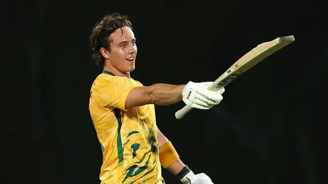 Dewald Brevis celebrating a century for South Africa v Australia