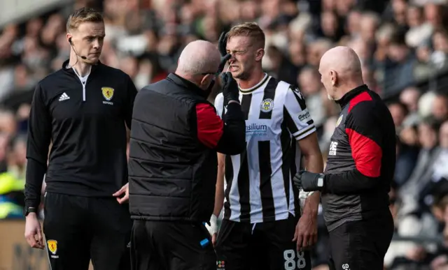 St Mirren's Killian Phillips receives medical attention during a William Hill Championship match between St Mirren and Dundee United at the SMiSA Stadium