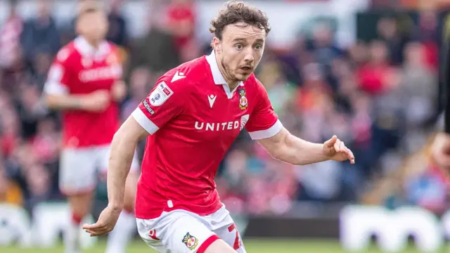 Ollie Rathbone playing for Wrexham against Charlton Athletic