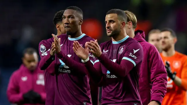 Burnley players Jaidon Anthony and Kyle Walker applaud fans
