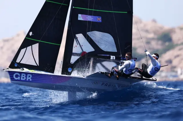 Anna Burnet and John Gimson in mixed multihull sailing action at the Paris Olympics