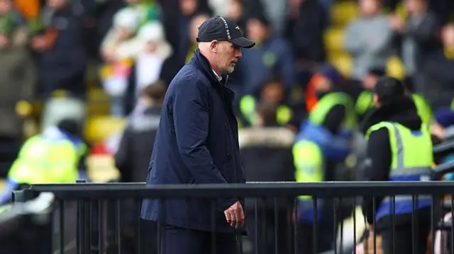 Norwich manager Philippe Clement walks away from the pitch at Watford