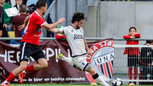undee United's Will Ferry (R) in action during a UEFA Conference League Second Round Qualifier Second Leg match between FC UNA Strassen and Dundee United