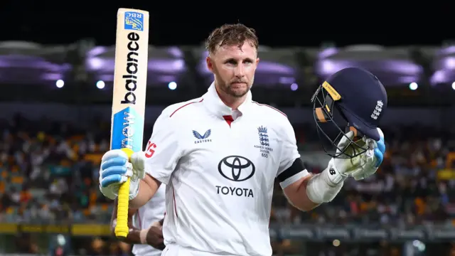 Joe Root acknowledges the Gabba crowd as he walks off unbeaten on 135 in second Ashes Test