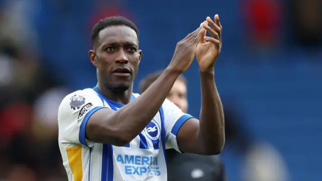 Danny Welbeck of Brighton & Hove Albion celebrates following the team's victory in the Premier League match between Brighton & Hove Albion FC and Manchester United FC 